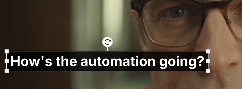 A subtitle on a dark box over a close-up.