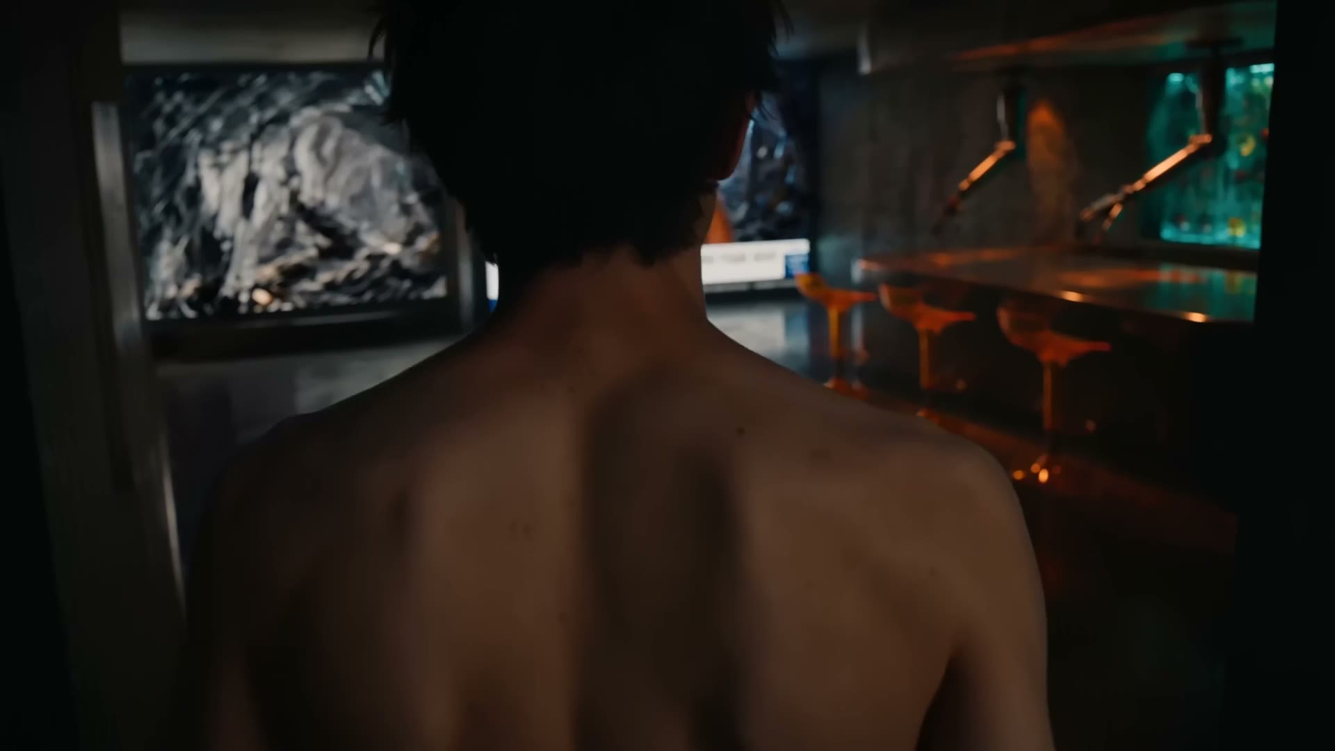The start frame: Cole from behind in the kitchen, from the Flick residency film Xenogenesis. One character, one room, the fridge as the obvious target of the action.