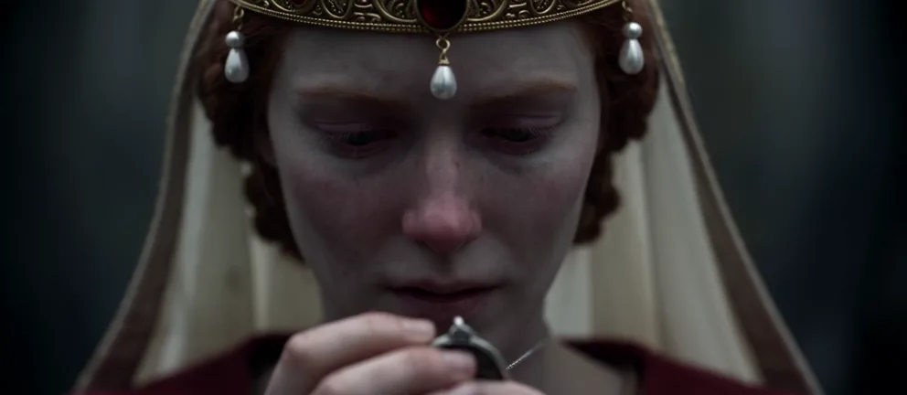 Holding the amulet, from In ’twixt Vows